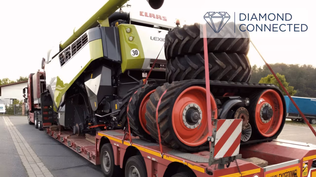 CLAAS LEXION 8700 TT kombains uz zemās grīdas platformas transportēšanai uz Latviju