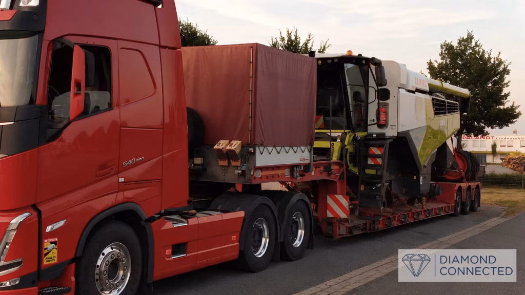 CLAAS LEXION 8700 TT kombains uz zemās grīdas platformas transportēšanai